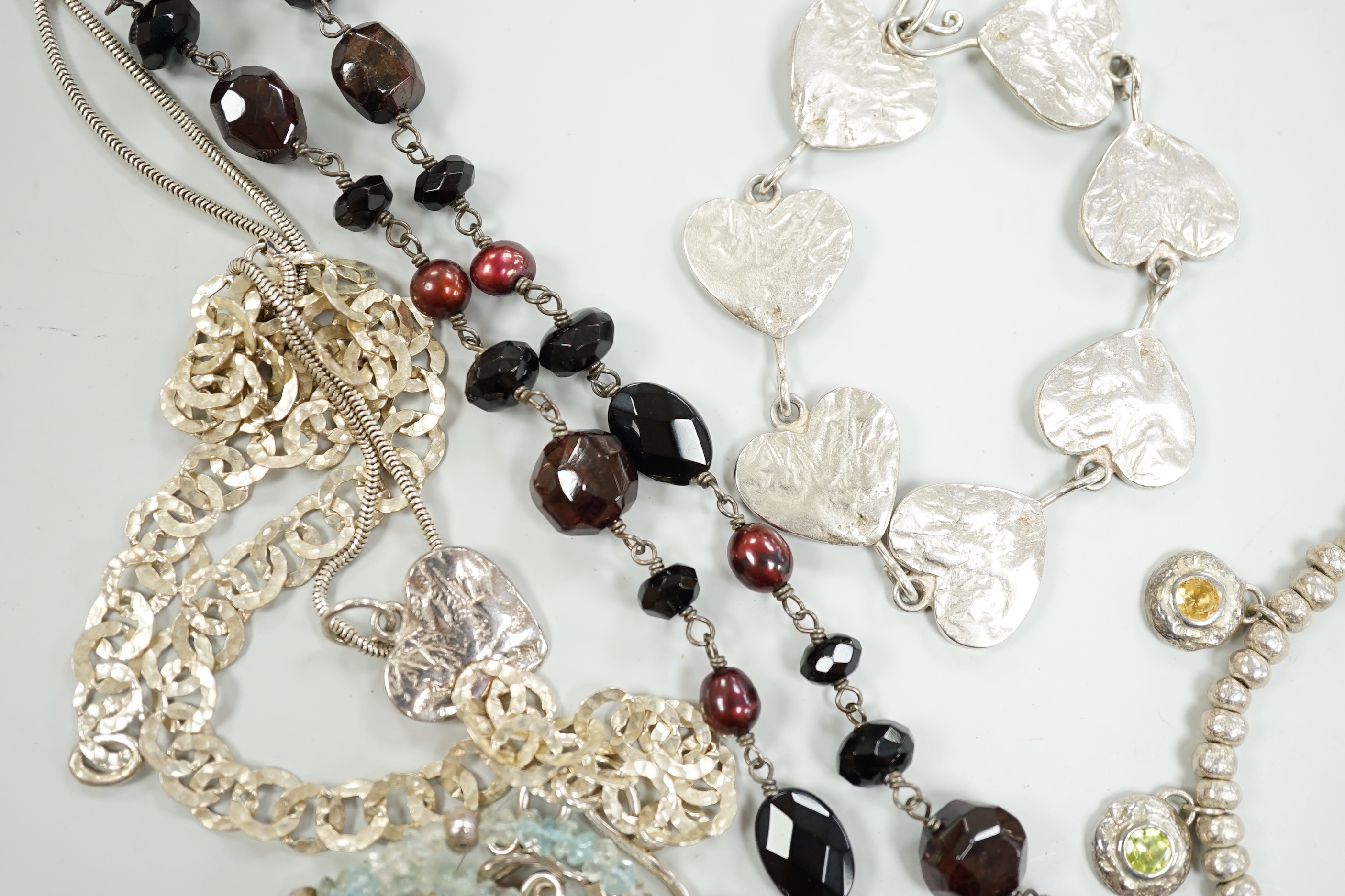 Two Pruden Smith silver necklaces and a similar bracelet, three other assorted silver necklaces and two silver bracelets, some with beads, largest 50cm.